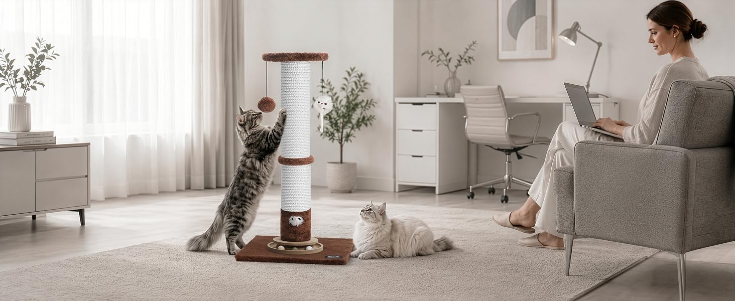Ahomdoo scratching post in a living room, one cat scratching the cotton rope post while the owner works nearby